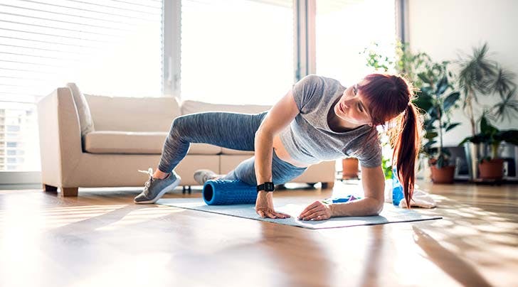 Woman-foam-rolling-her-leg.jpg